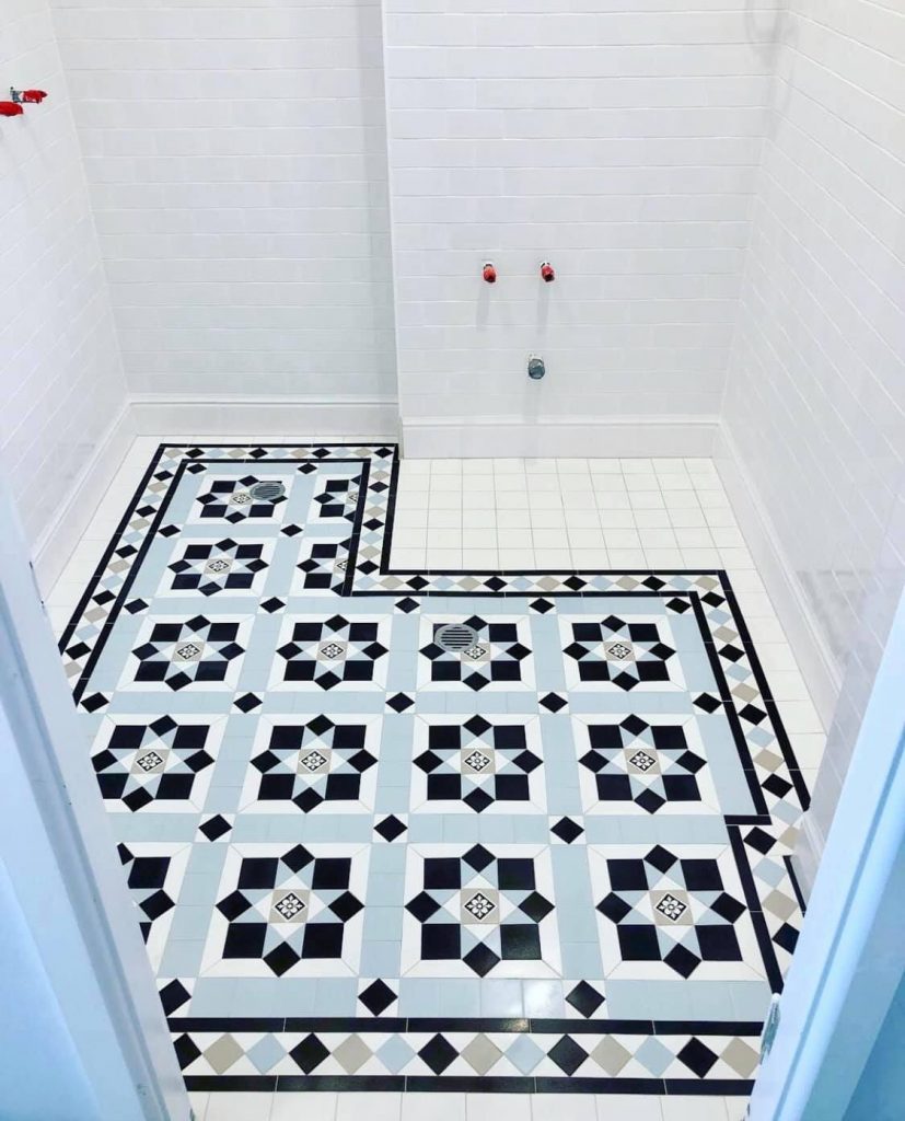 Blue, black and white tessellated bathroom floor tiling Sydney