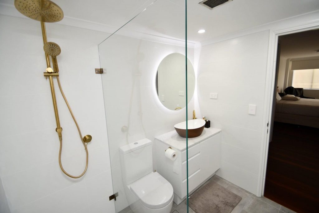 Modern white bathroom renovation in Sydney CBD